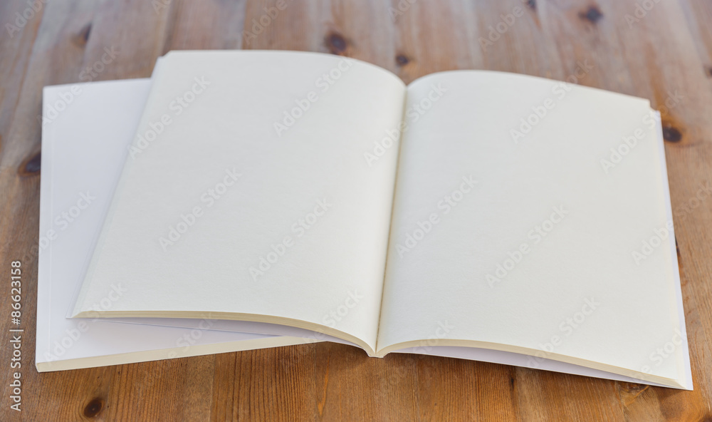 Blank catalog, magazines,book mock up on wood background Blank catalog, magazines,book mock up on wood background