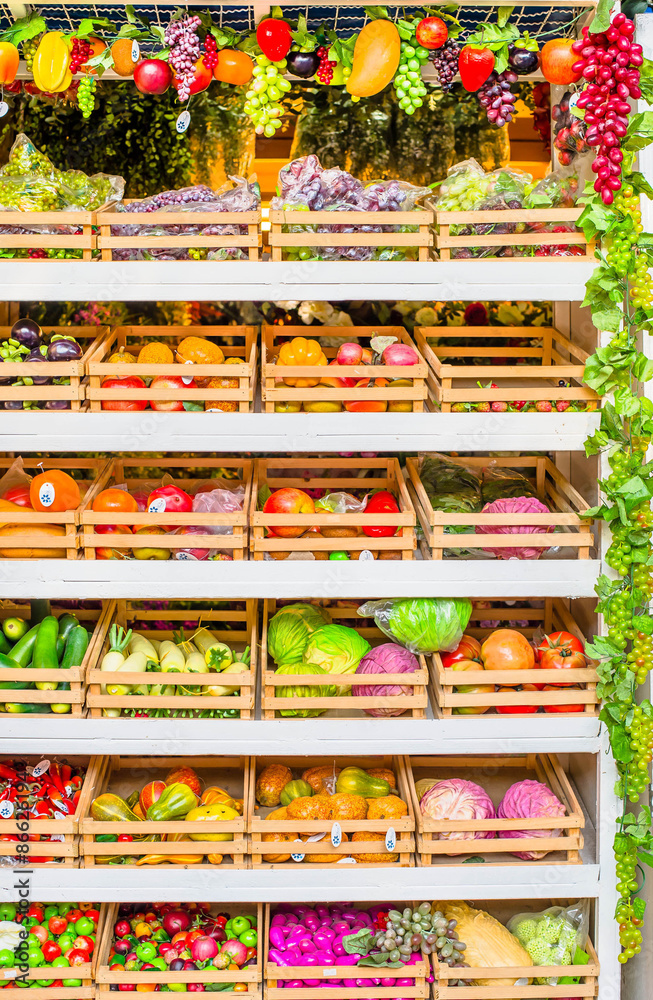 Naklejka premium Fruit market with various colorful fresh fruits and vegetables