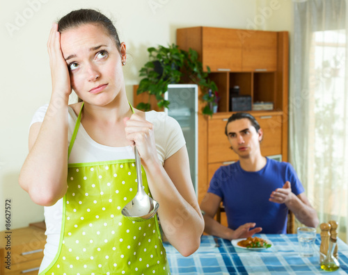 Girl serving lunch her man photo