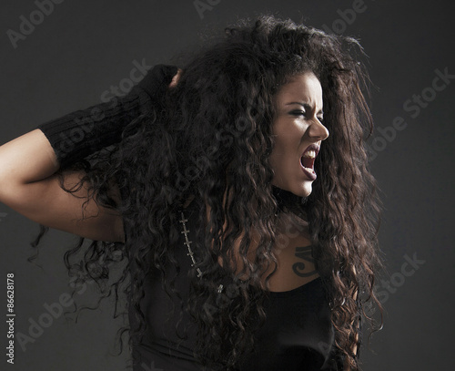 Angry rocker girl screaming