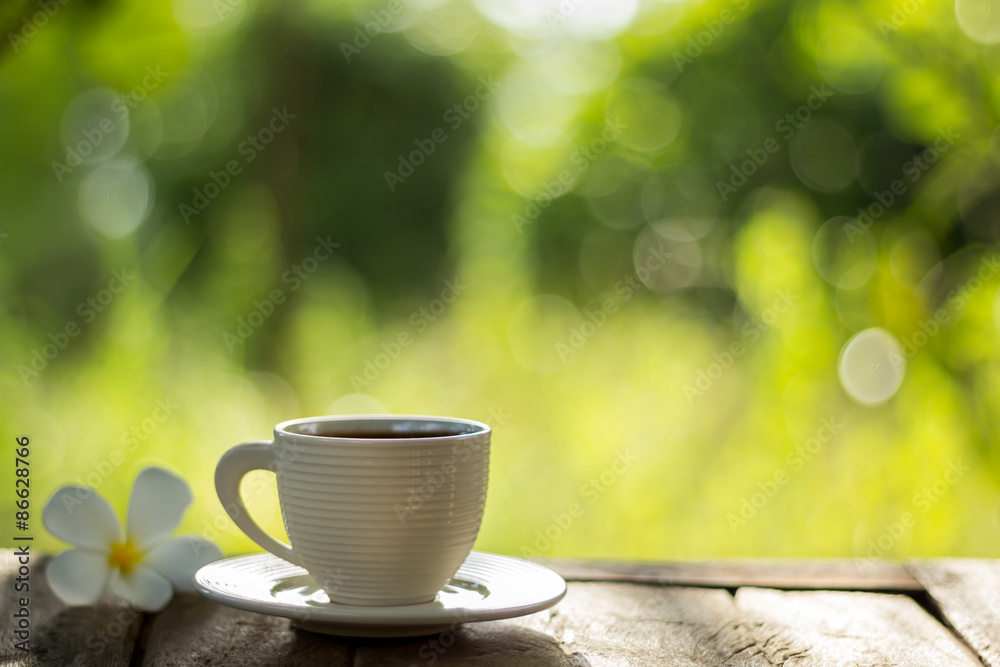 coffee cup on green background