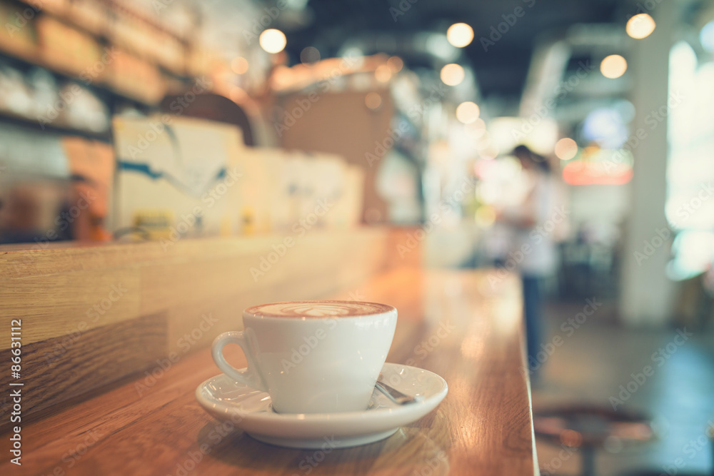 Fototapeta premium Coffee cup at coffeeshop vintage tone