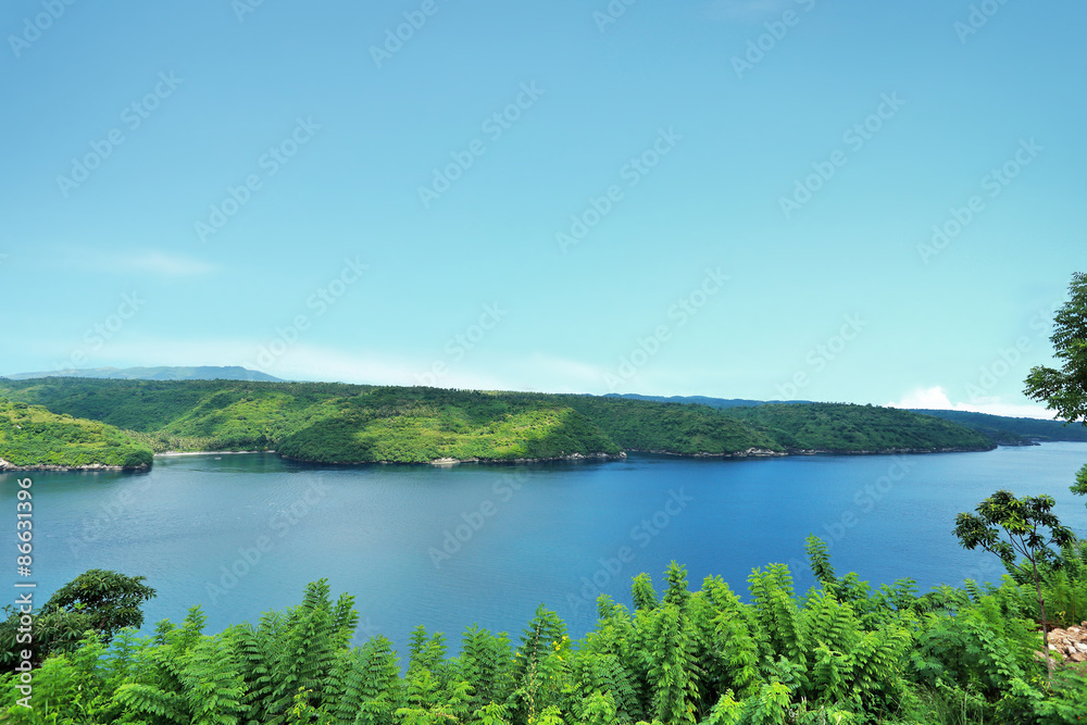 beautiful view of blue sea and green island