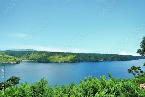 beautiful view of blue sea and green island