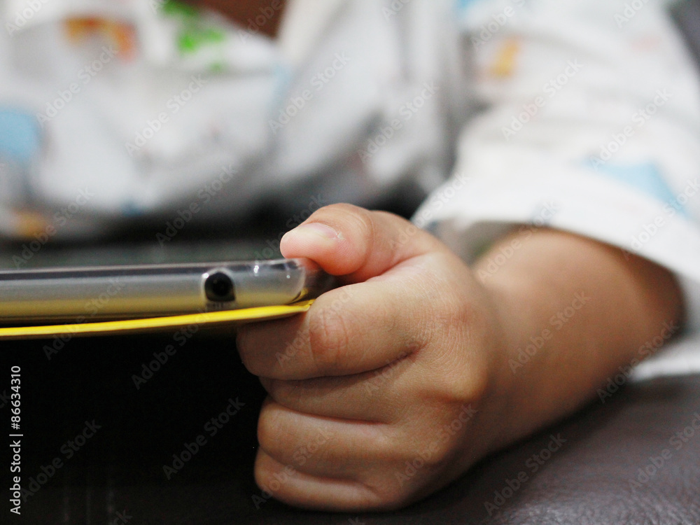 Tablet /  Tablet in a kid's hand