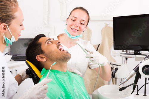 Patient checking the teeth