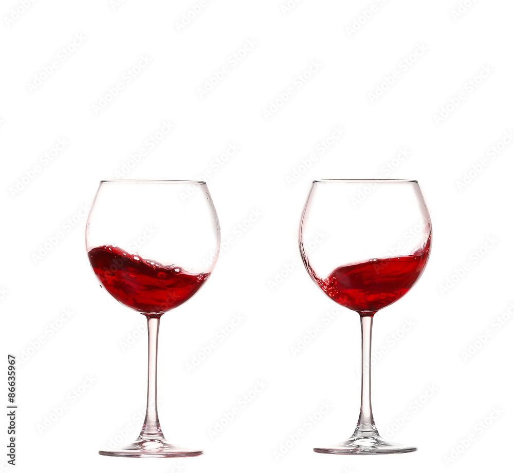 Wine collection - Splashing red wine in a glass. Isolated on whi Wine collection - Splashing red wine in a glass. Isolated on whi