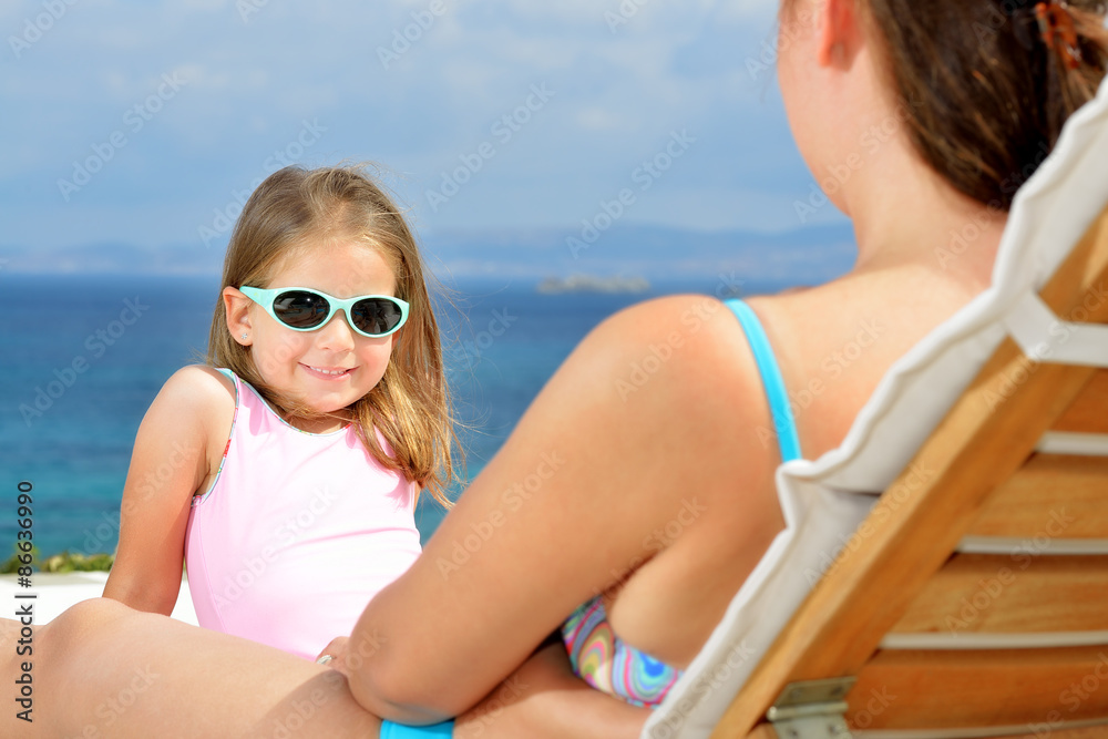 Adorable girl on sunbed Adorable girl on sunbed