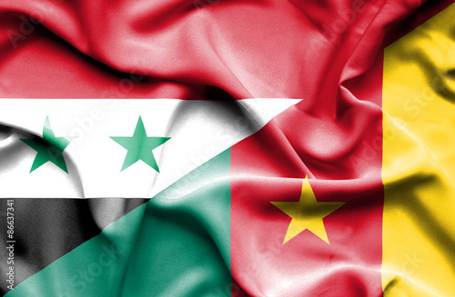 Waving flag of Cameroon and Syria