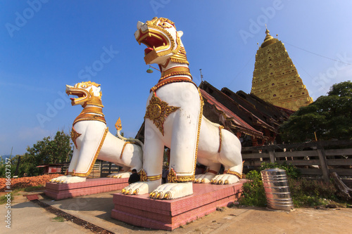 Chedi Buddhakhaya, built to mimic the Mahabodhi stupa of Bodhgaya in India, is a symbol of Sangkhlaburi, Kanchanaburi, Thailand. photo