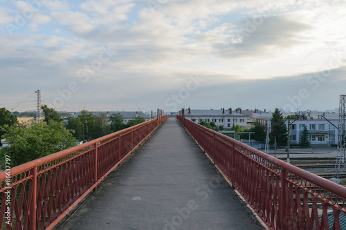 High long bridge across the tracks at a major train station (nod © IgorTravkin