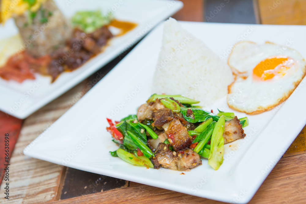 Kale with crispy pork and rice
