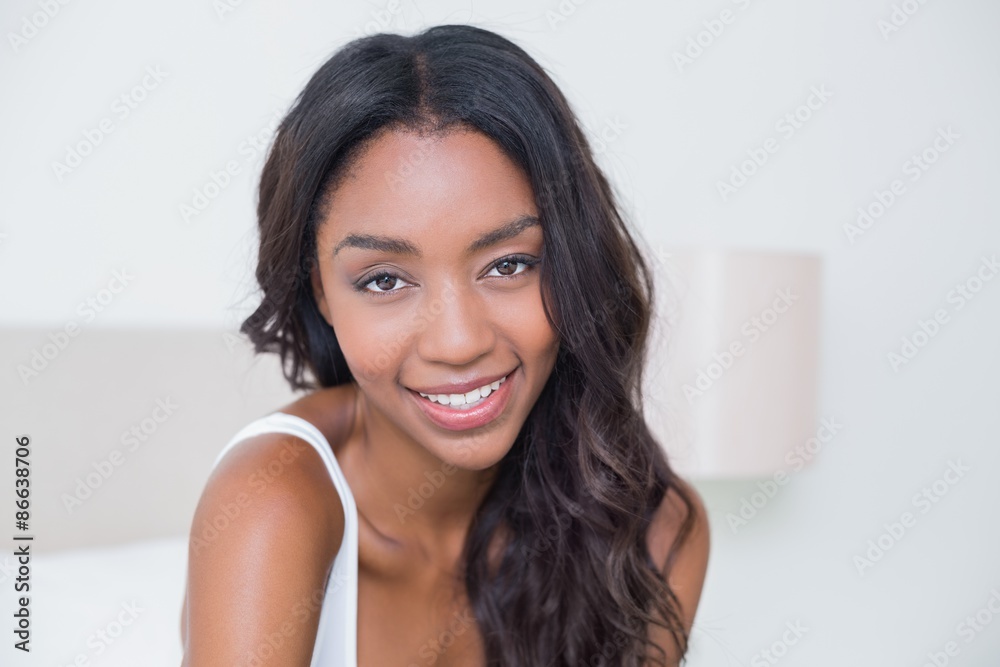 Beautiful woman smiling at camera Beautiful woman smiling at camera