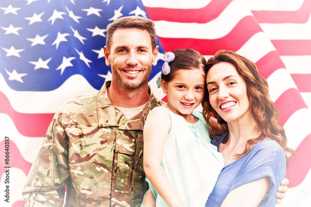 Composite image of soldier reunited with family