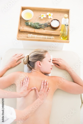 Woman enjoying a back massage 