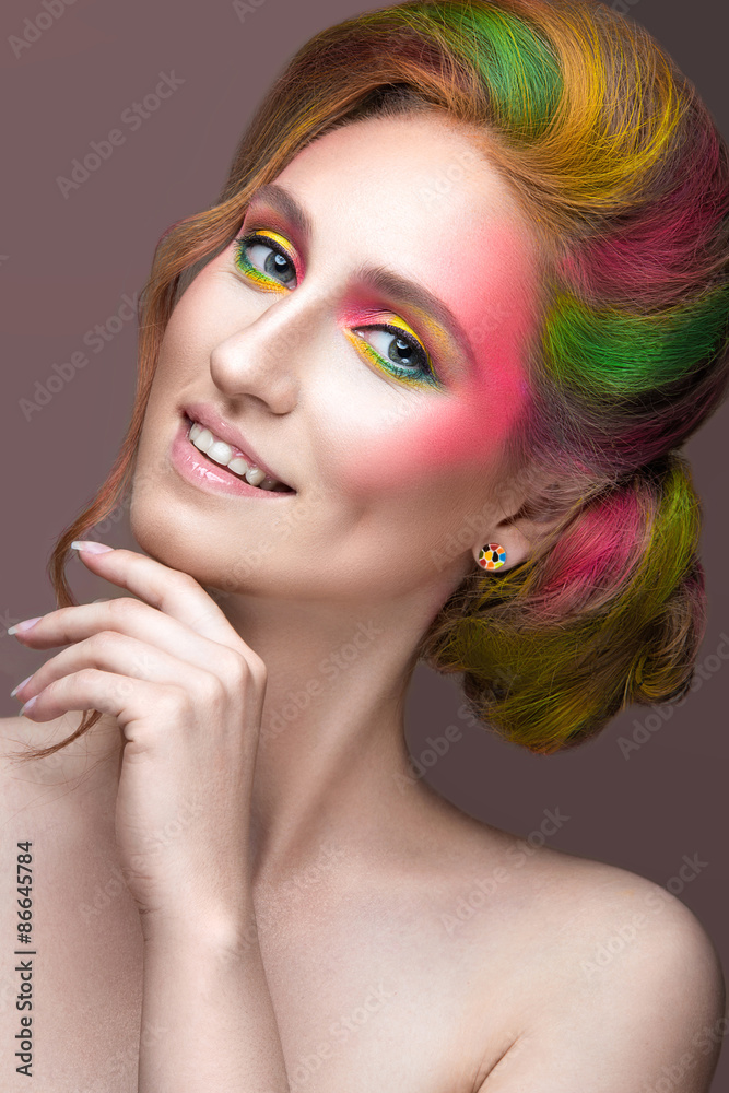 Naklejka premium Fashion Girl with colored face and hair painted. Art beauty