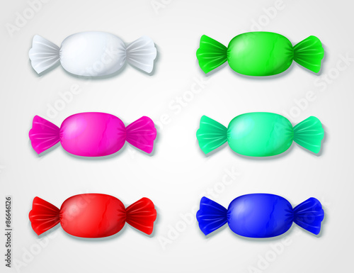 set of colored candies in wrappers