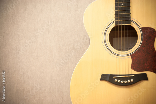 Close up guitar with copy space on gray background - vintage effect