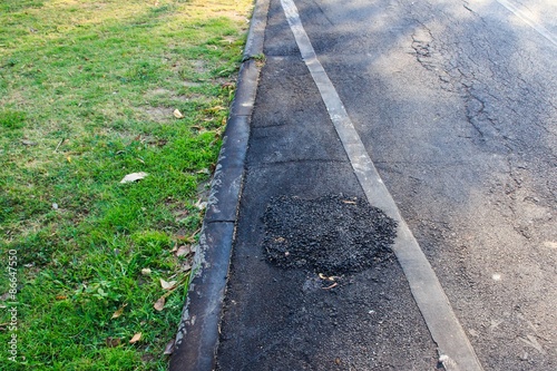Poorly Patched Pavement.