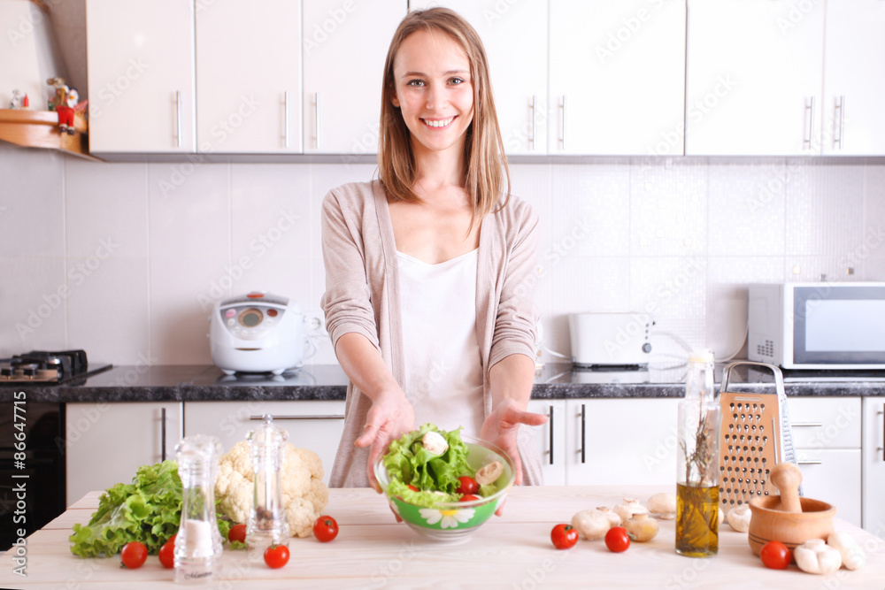 smiling woman making healthy food