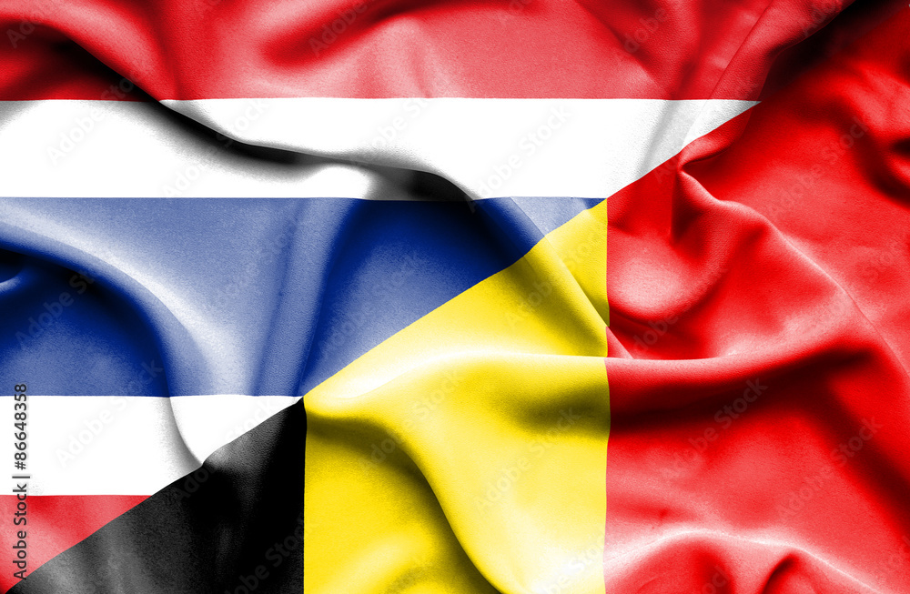 Waving flag of Belgium and Thailand