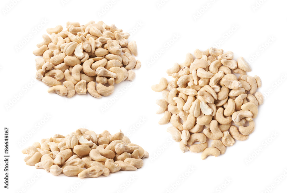Pile of multiple cashew nuts isolated Pile of multiple cashew nuts isolated