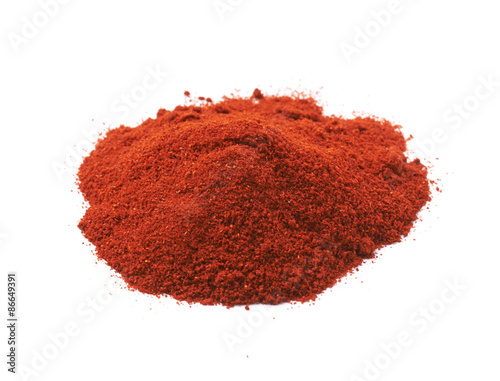 Pile of red paprika powder isolated
