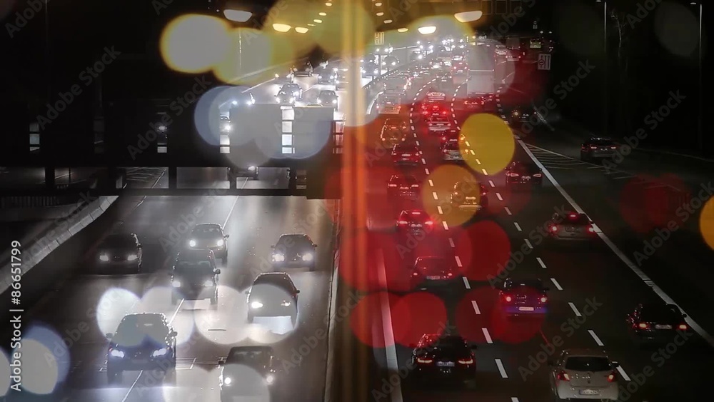 Abstract Freeway Traffic in a Big City with Bokeh at night. 