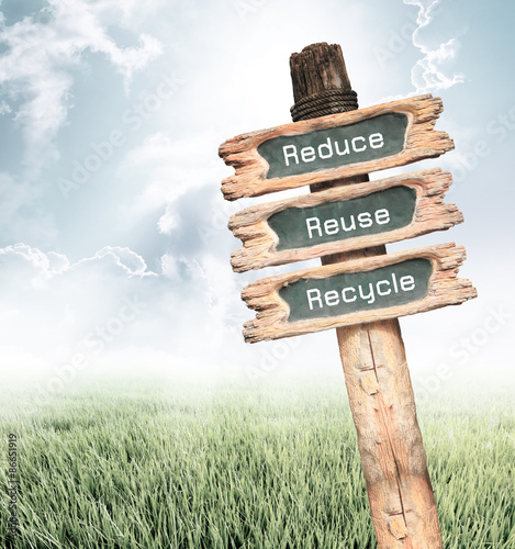 Wooden sign with Reduce, Reuse and Recycle wording ecology conce