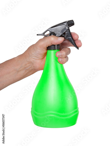 Sprayer in the hand of an old woman