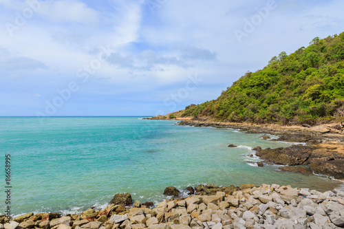 Sky with beautiful beach with rocks and tropical sea