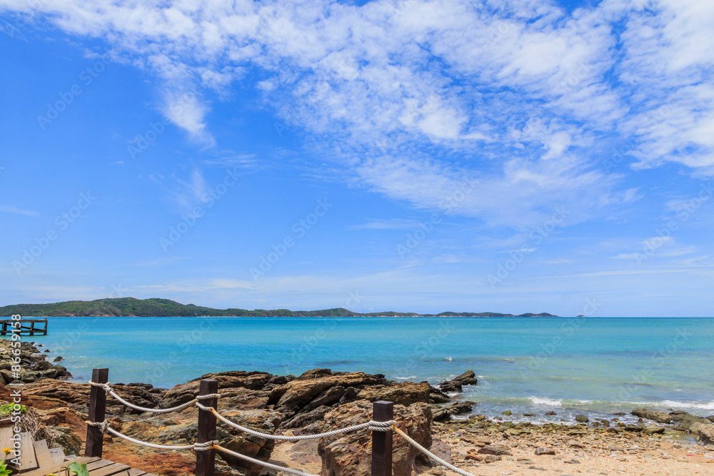 Sky with beautiful beach with rocks and tropical sea