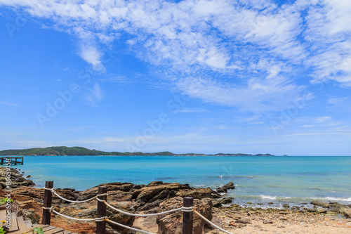 Sky with beautiful beach with rocks and tropical sea