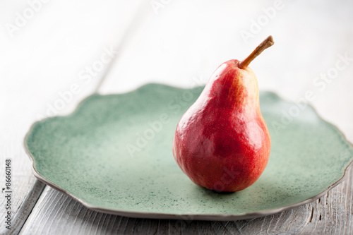 Ripe pear on the plate