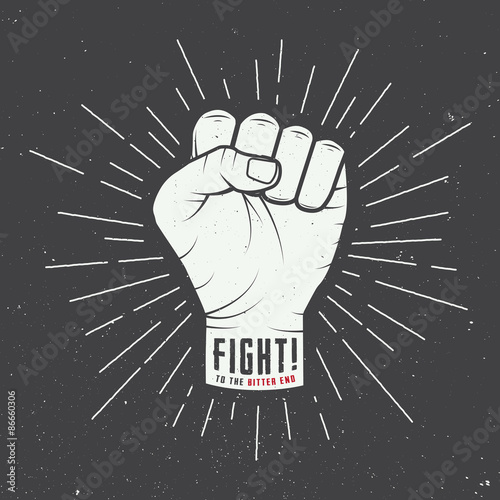 Fist with sunbursts in vintage style. Vector illustration