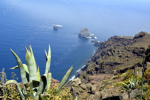 Vista a los roques de Salmor con aloe vera, desde el mirador de la Peña. Isla de El Hierro. Canarias photo