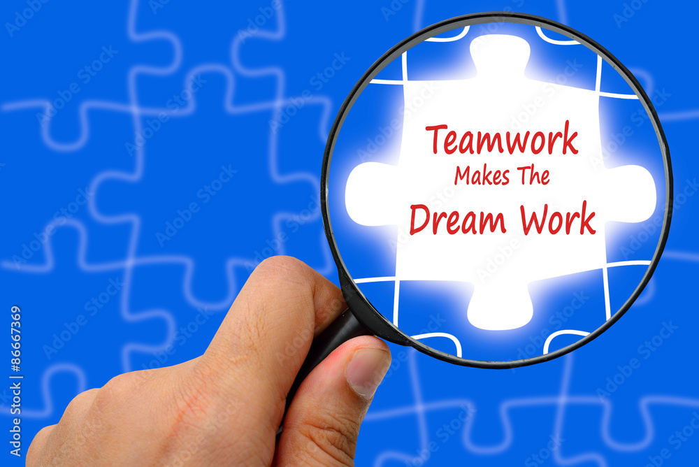 Teamwork Makes The Dream Work word. Magnifier and puzzles. Stock Photo ...