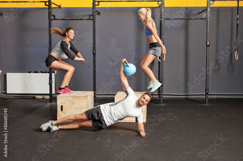 Bilde på lerret Fitness training - box jump and kettlebell training