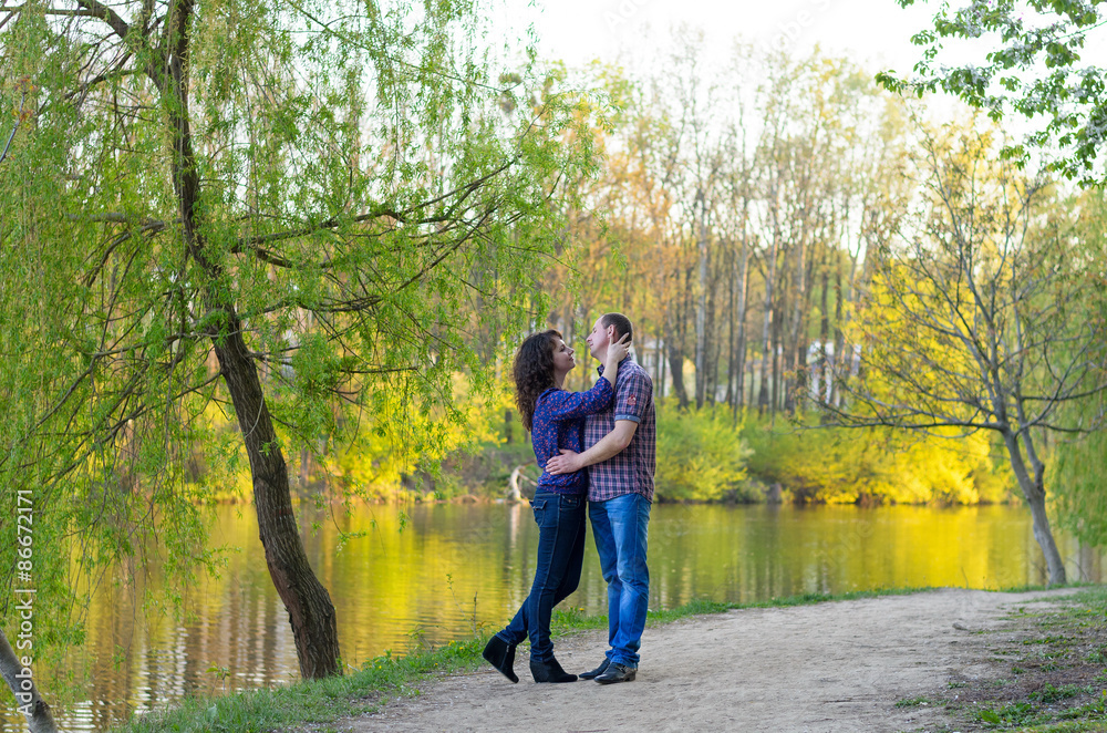 Fototapeta premium family dad mother and daughter on a walk on nature