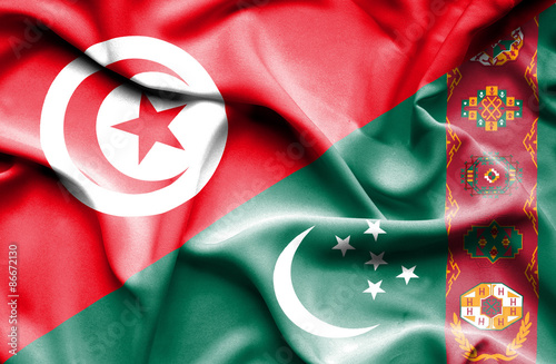 Waving flag of Turkmenistan and Tunisia