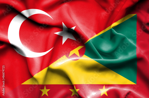 Waving flag of Guernsey and Turkey