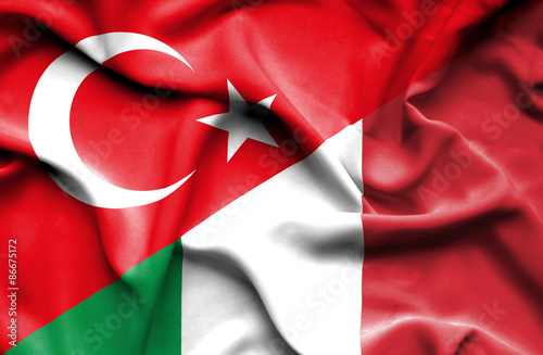 Waving flag of Italy and Turkey