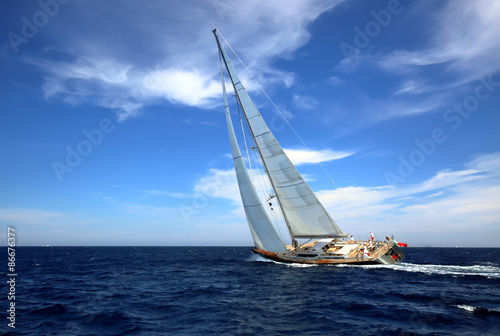 Yacht at full speed in a boat race (team unidentified)