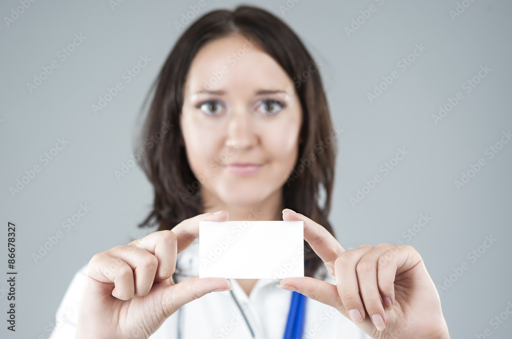 Portrait of Medical Female Doctor Presenting and Showing White C Portrait of Medical Female Doctor Presenting and Showing White C