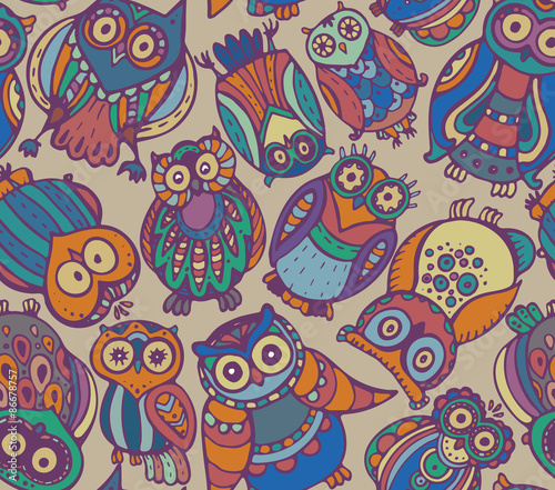 Vector seamless pattern with cute colorful owls.