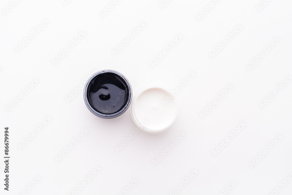 Paint in jars and brush