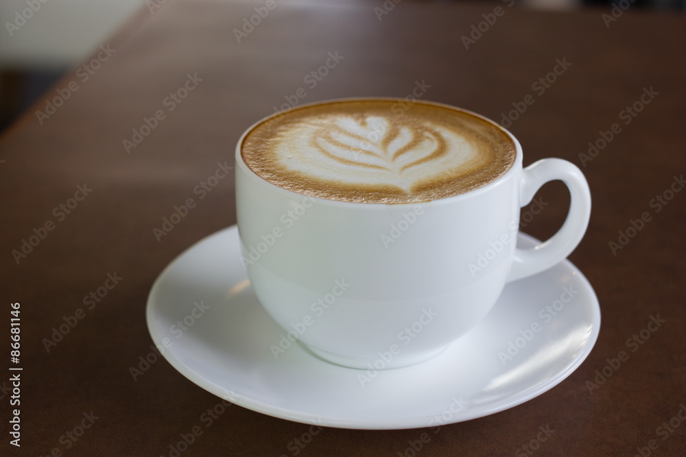 Cup of art latte or cappuccino coffee. Cup of art latte or cappuccino coffee.