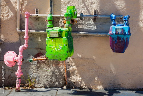 Colorfully painted utility meter photo