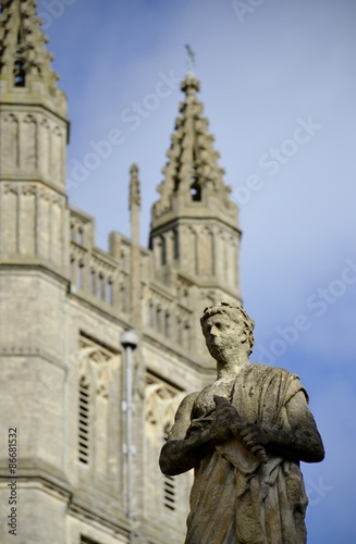 Old statues from Bath and background 