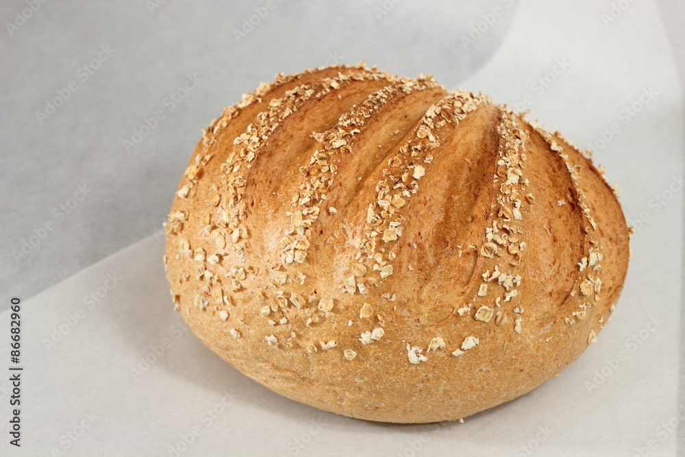 fresh homemade bread on paper background. fresh homemade bread on paper background.